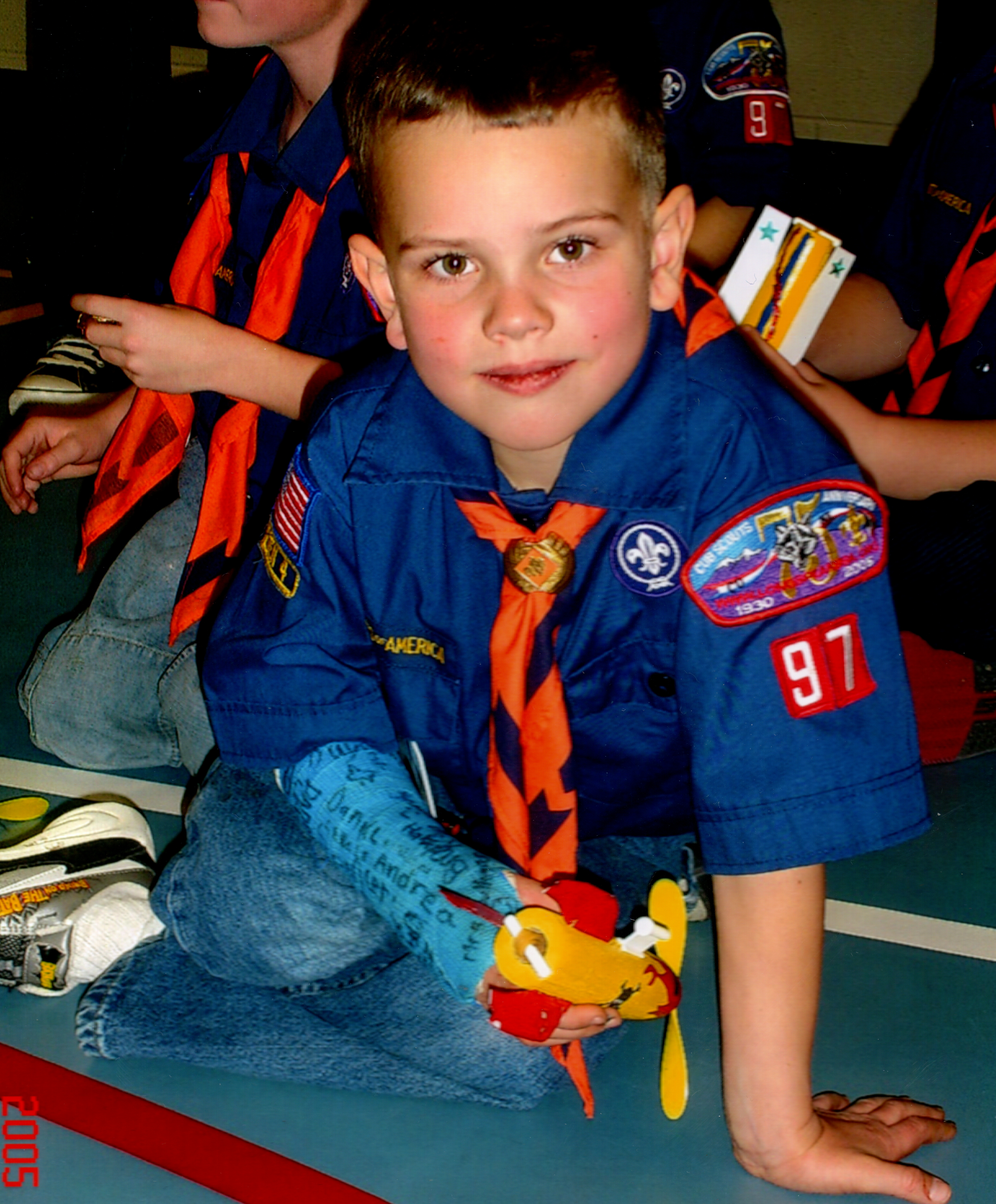 Nicolas as a young tiger cub scout holding his rocket for the derby