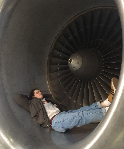 Nick relaxes in a jet aircraft turbine